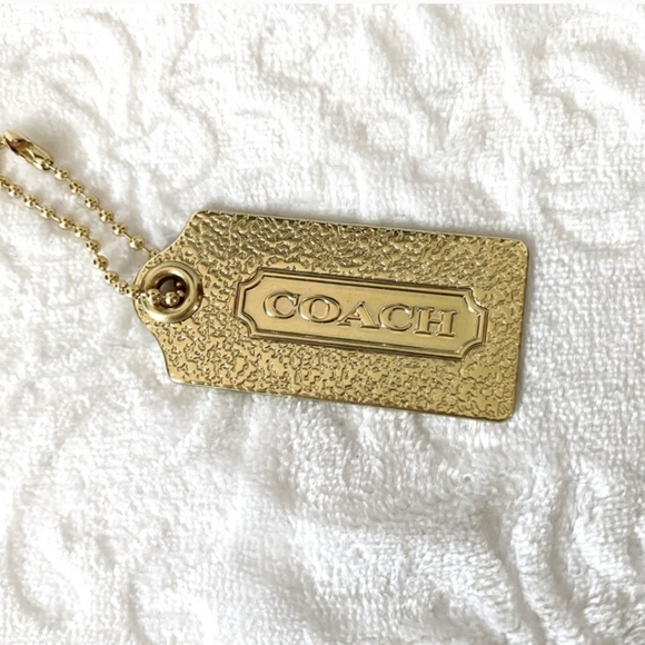 Coach Accessories - Coach EUC RARE Crackled Gold Metal Hangtag